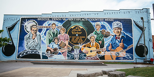 A mural on the side of a building in Bristol, TN, noting it as the birthplace of country music.